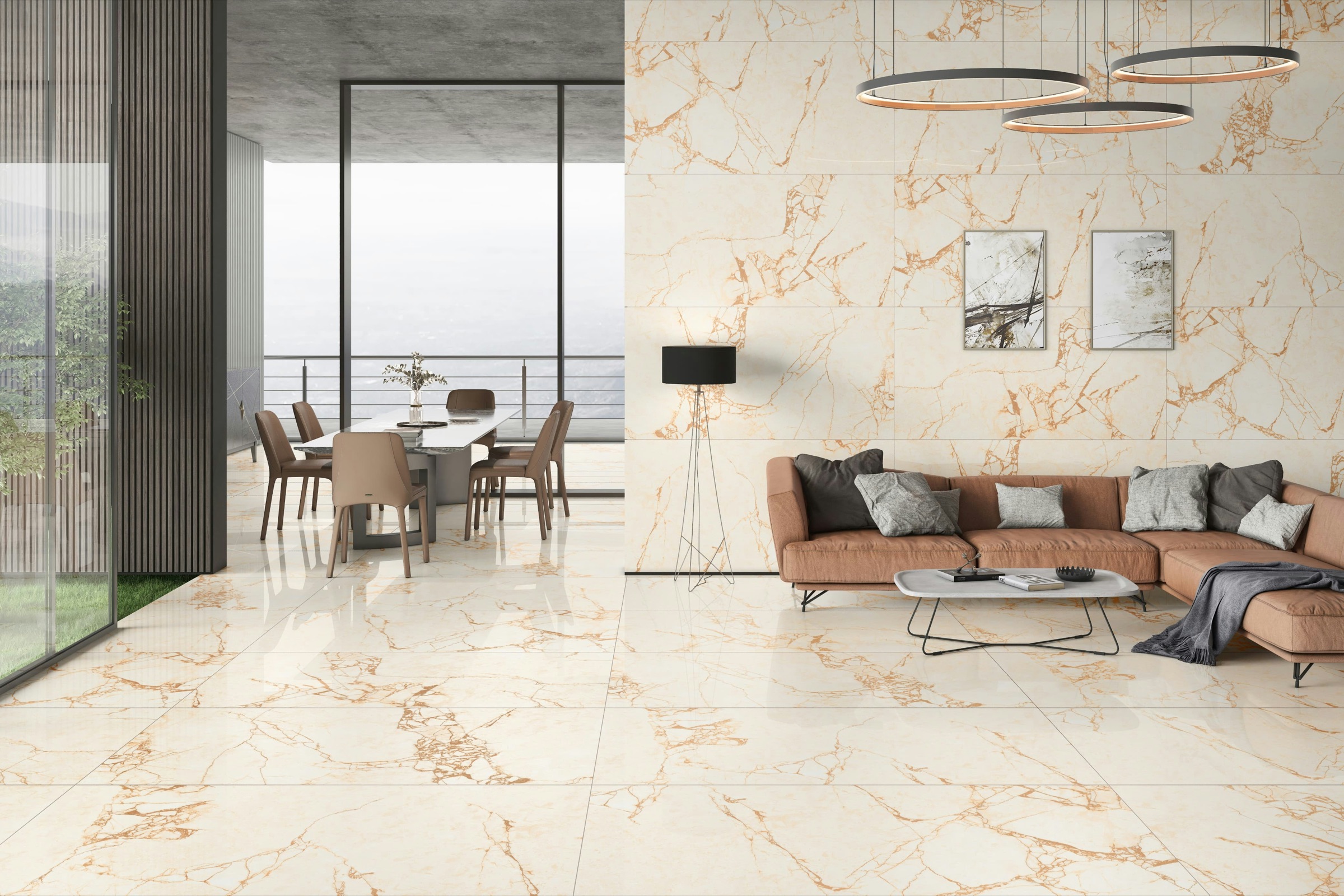 Wohnraum mit goldener Marmoroptik und großformatigen Fliesen von YA-Design